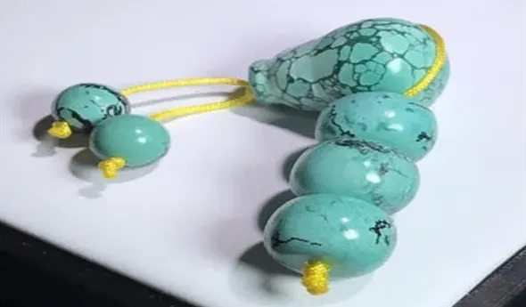 怎么分辨凌美矿仿的绿松石,蓝色的菱镁矿是染色的么？